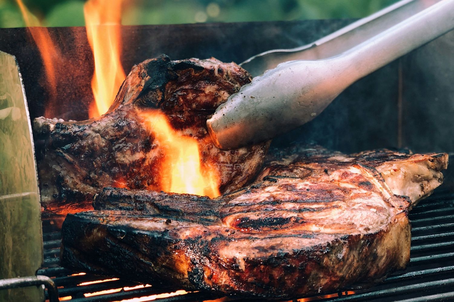 Grilling a steak on a BBQ